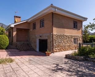 Exterior view of House or chalet for sale in Manzanares El Real  with Heating, Private garden and Terrace