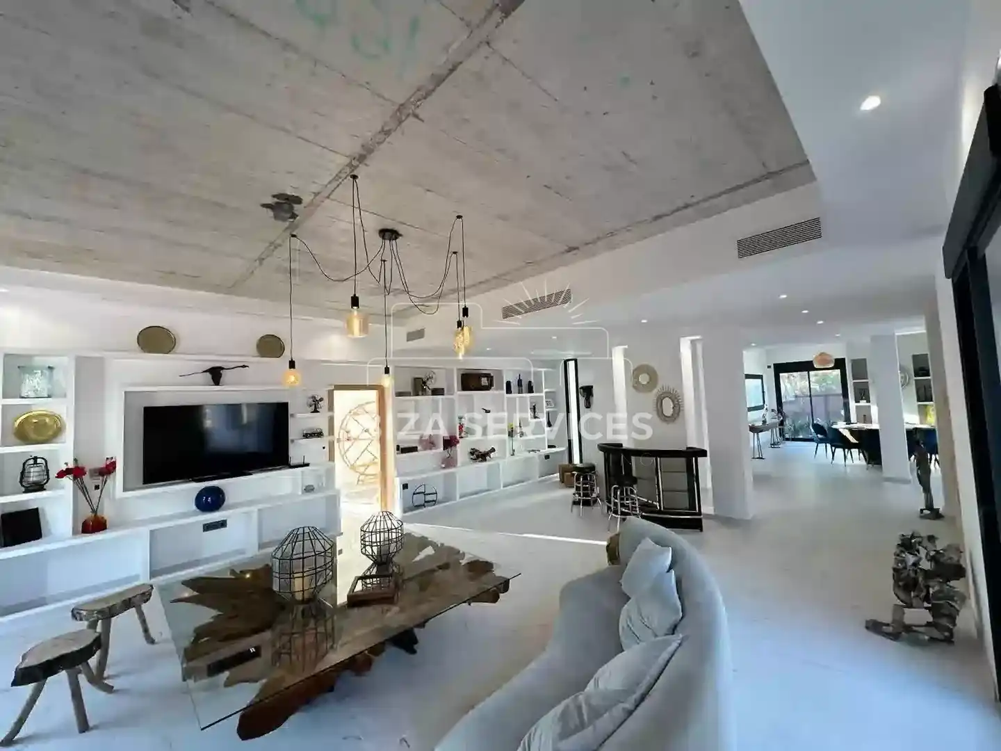 Sala de estar de Casa o chalet de alquiler en Santa Eulària des Riu con Aire acondicionado, Jardín privado y Piscina