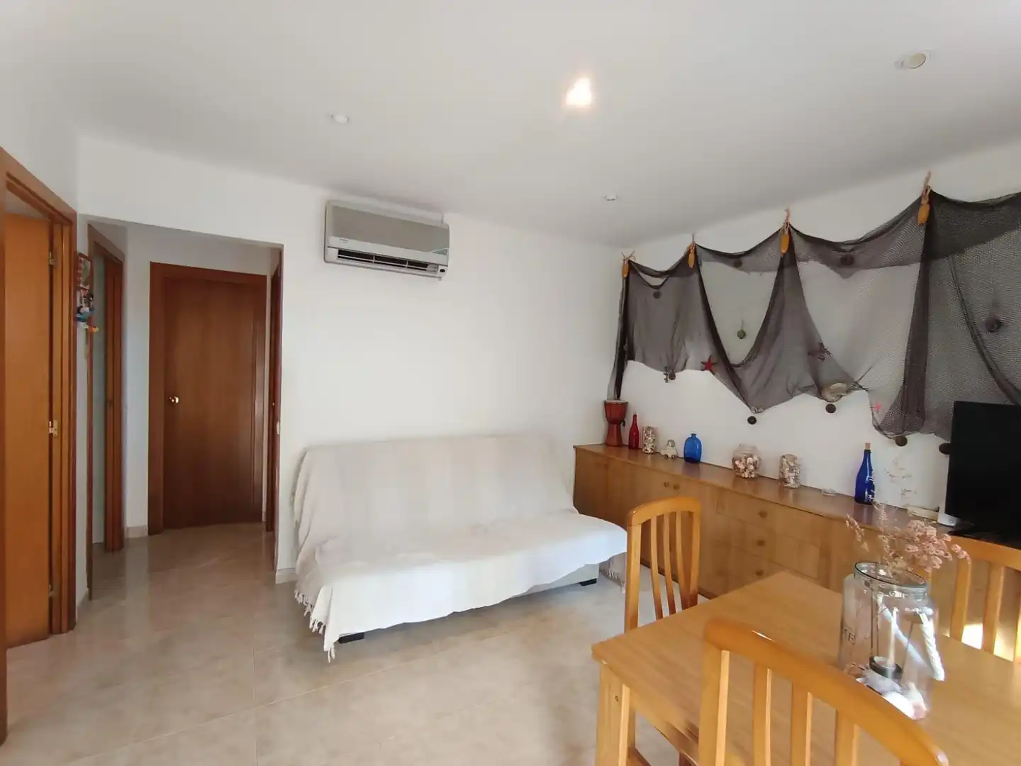 Sala de estar de Apartamento en venta en Castell d'Aro, Platja d'Aro i s'Agaró con Aire acondicionado, Calefacción y Terraza