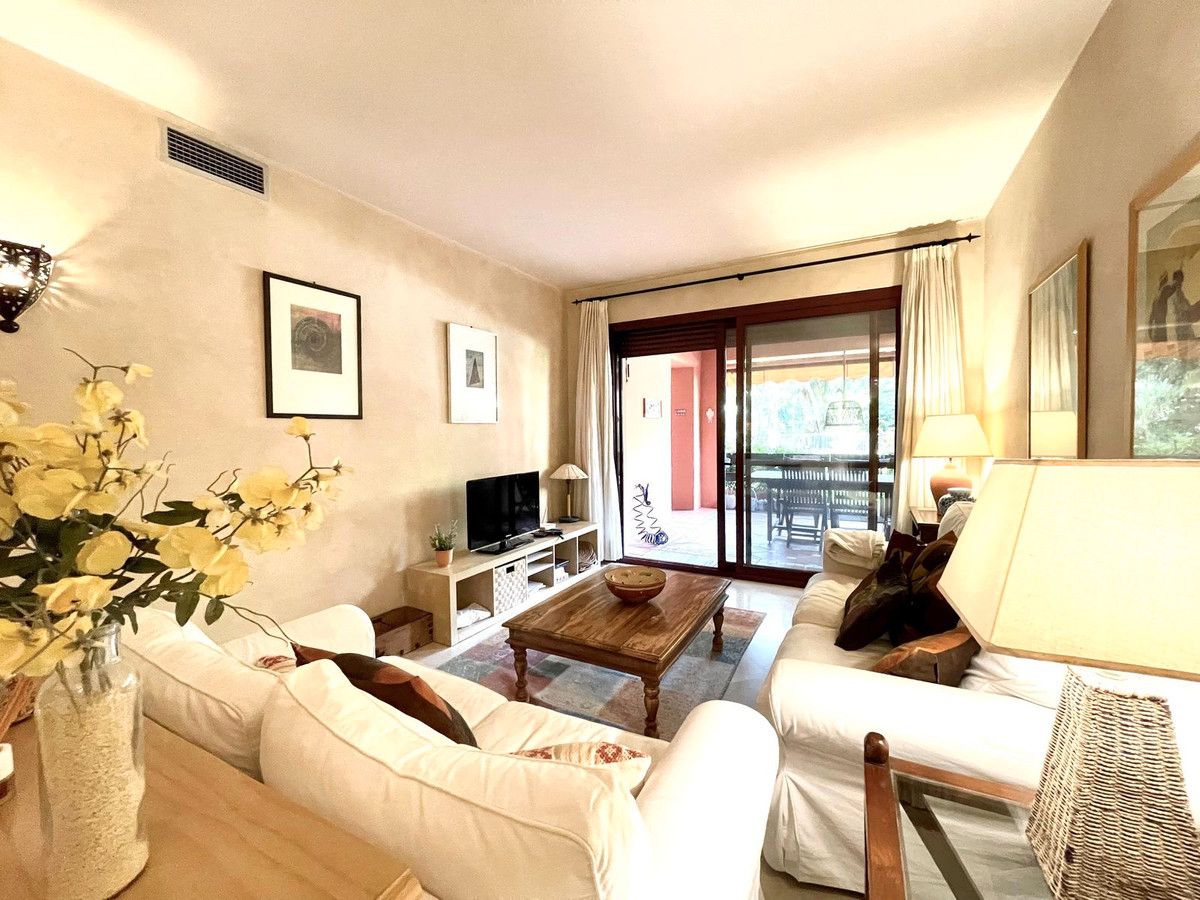 Living room of Flat for sale in Marbella  with Air Conditioner, Terrace and Storage room