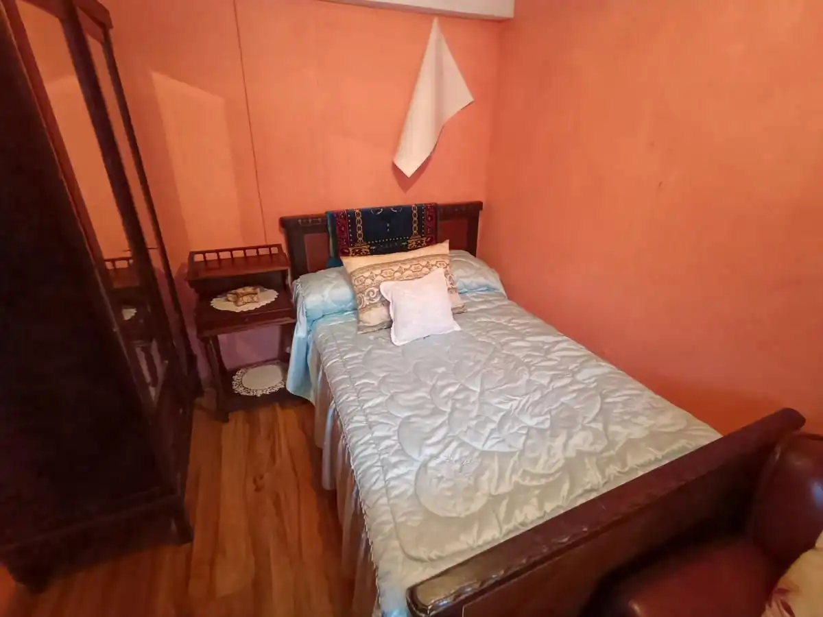 Schlafzimmer von Einfamilien-Reihenhaus zum Verkauf in Peñamellera Alta mit Heizung, Privatgarten und Terrasse