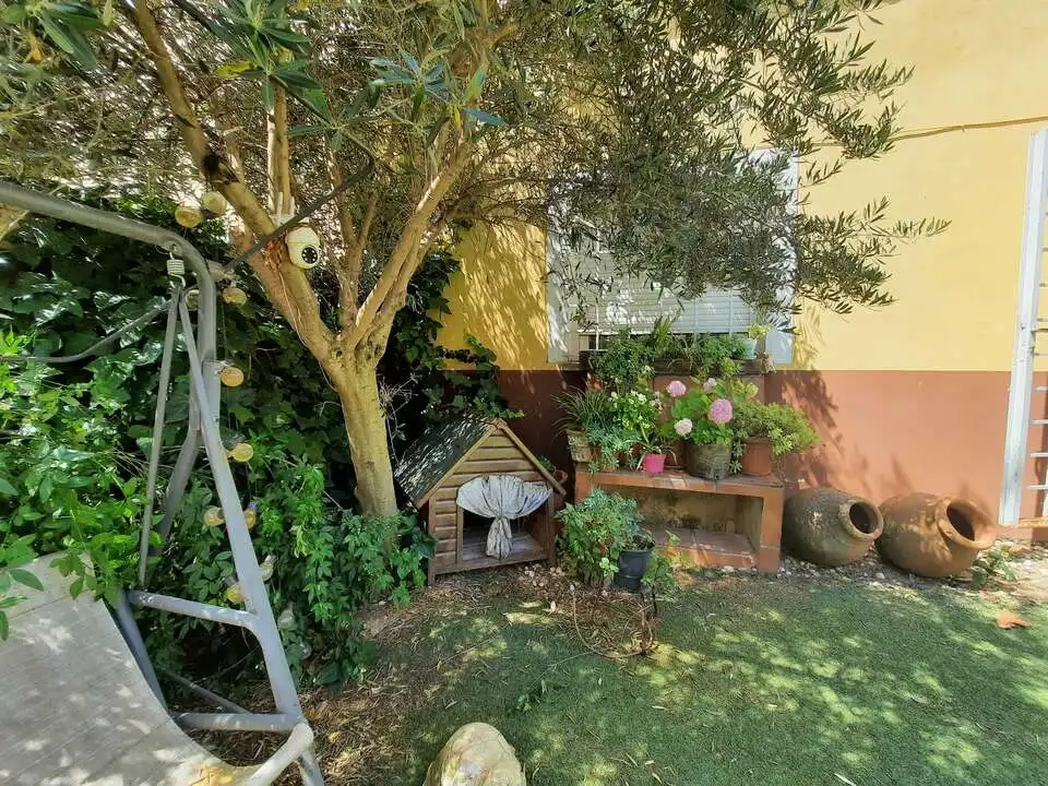 Garten von Einfamilien-Reihenhaus zum Verkauf in Escalona mit Klimaanlage, Heizung und Terrasse