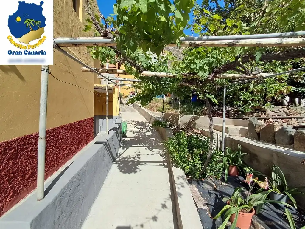 Außenansicht von Wohnung zum Verkauf in Mogán mit Privatgarten und Terrasse