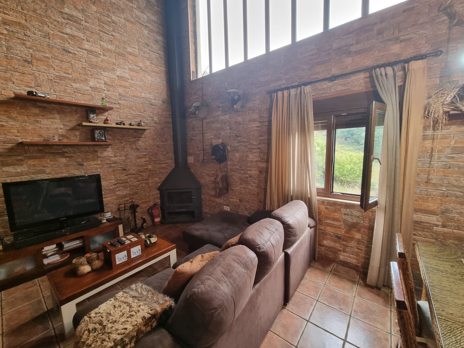 Sala d'estar de Casa o xalet en venda en Langreo amb Moblat