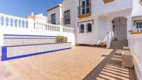 Vista exterior de Casa adosada en venda en Huércal de Almería amb Aire condicionat, Jardí privat i Terrassa