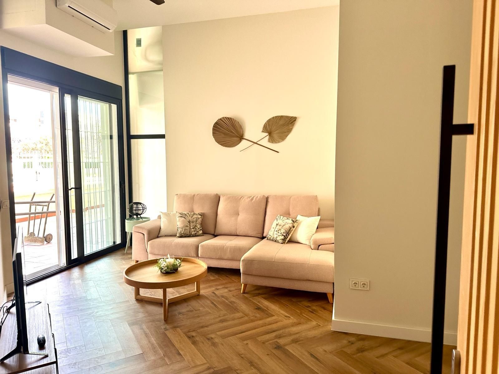 Sala d'estar de Apartament en venda en Fuengirola amb Aire condicionat, Calefacció i Jardí privat