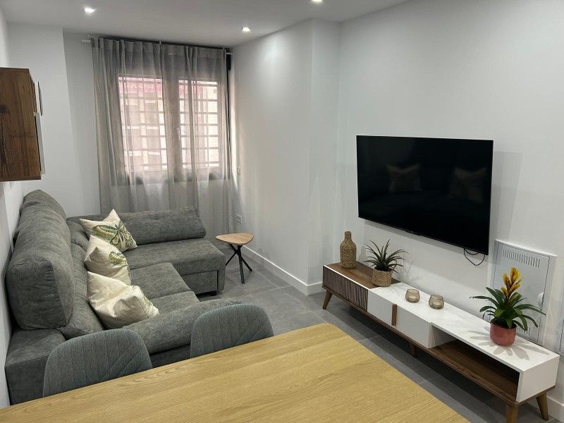 Living room of Planta baja to rent in Fuengirola  with Air Conditioner, Heating and TV