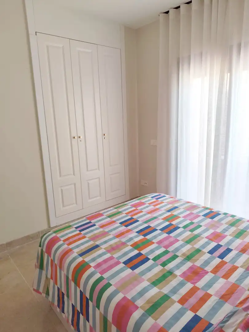 Dormitori de Apartament en venda en Manilva amb Aire condicionat, Terrassa i Piscina