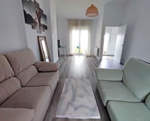 Sala d'estar de Casa adosada en venda en Don Benito amb Aire condicionat i Terrassa