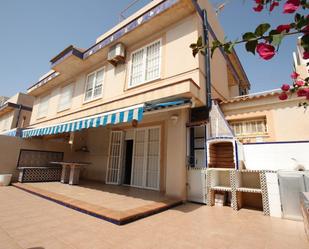 Exterior view of Single-family semi-detached for sale in Guardamar del Segura  with Air Conditioner, Heating and Terrace