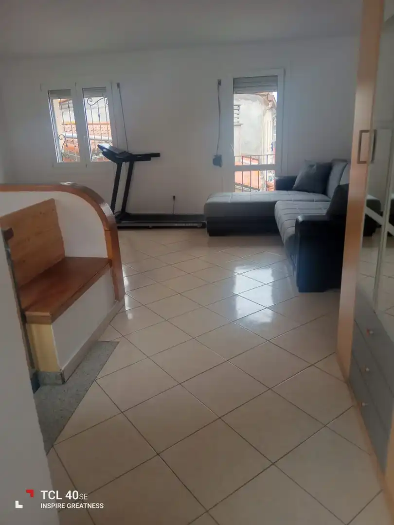 Sala de estar de Casa adosada en venta en Centre