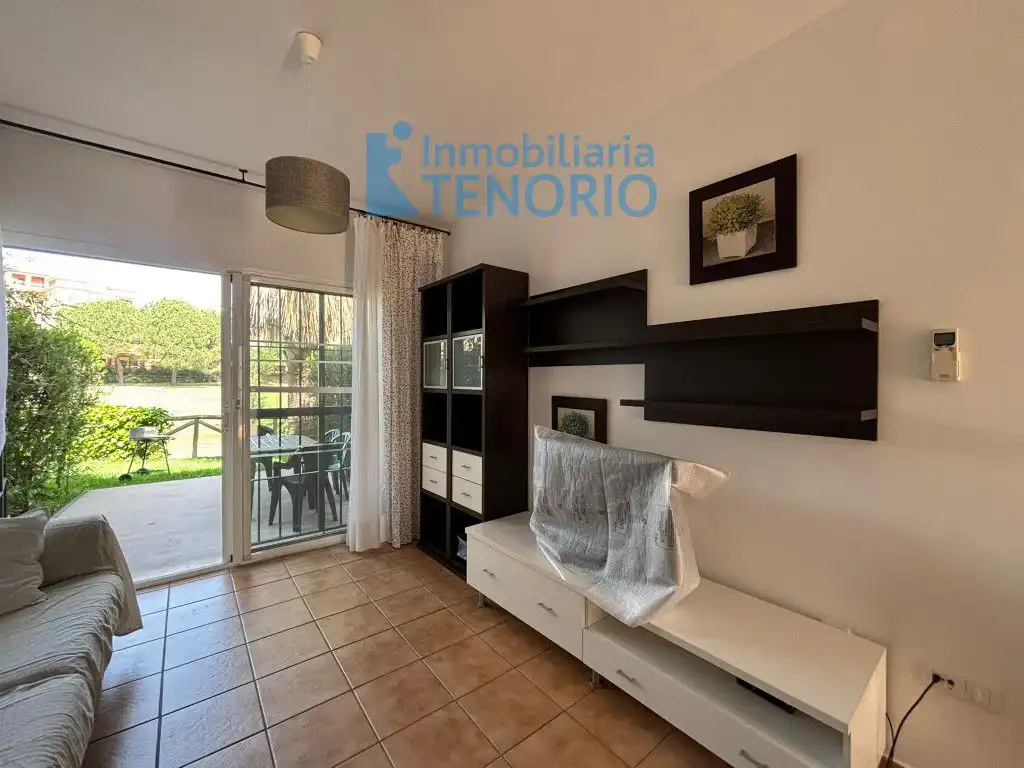 Sala de estar de Casa adosada en venta en Islantilla con Aire acondicionado, Terraza y Trastero