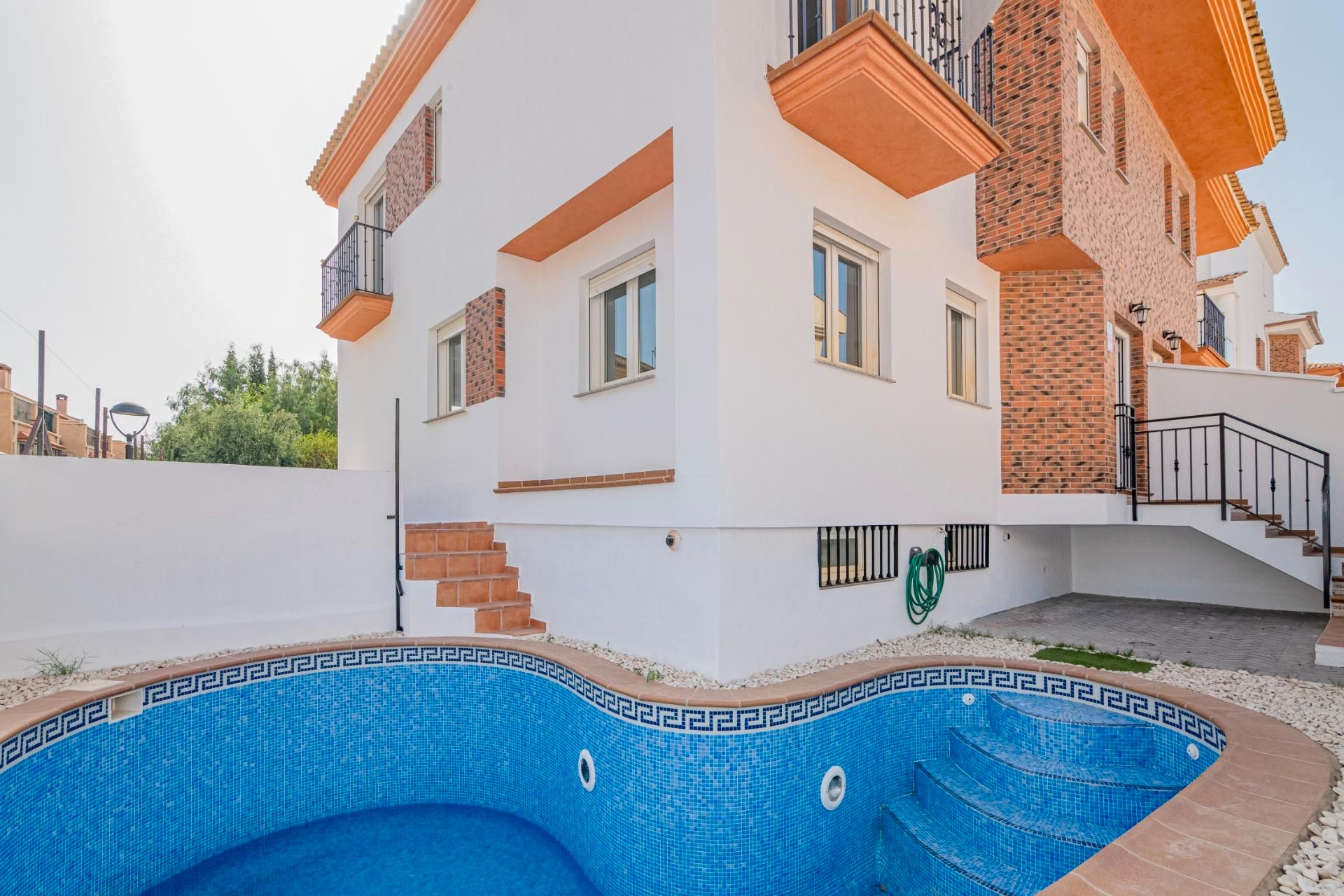 Exterior view of Single-family semi-detached for sale in Ogíjares  with Air Conditioner, Heating and Swimming Pool