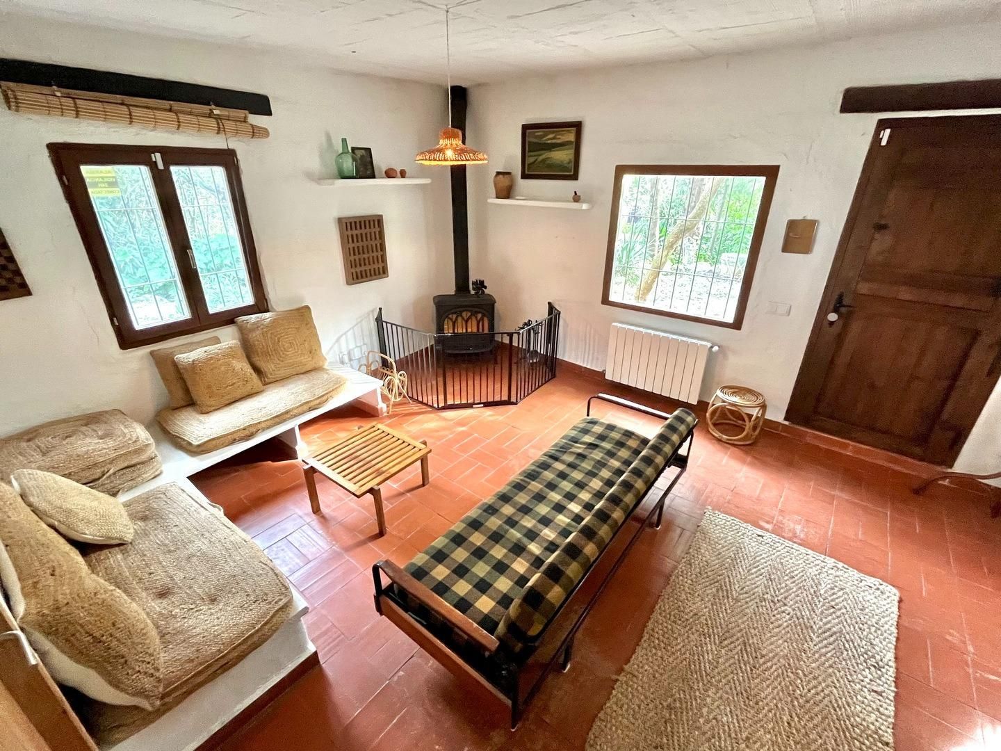 Sala de estar de Finca rústica en venta en Godall con Jardín privado, Terraza y Trastero