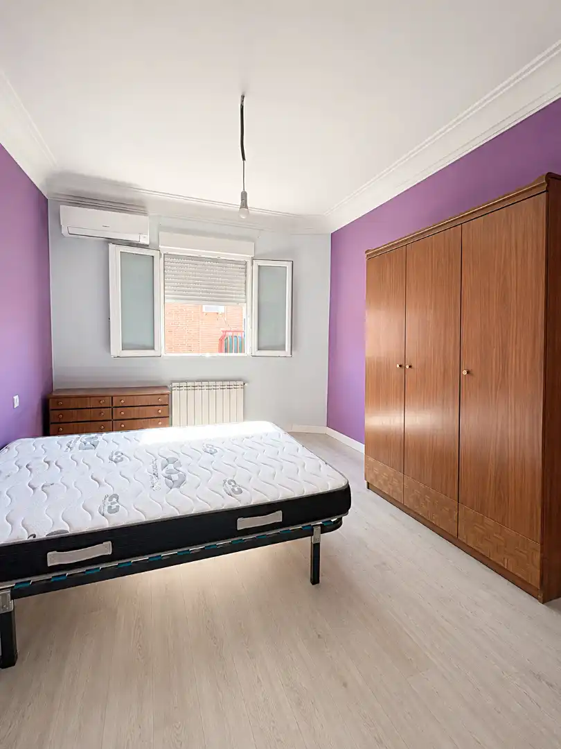 Schlafzimmer von Wohnung zum Verkauf in Madrid mit Klimaanlage und Balkon