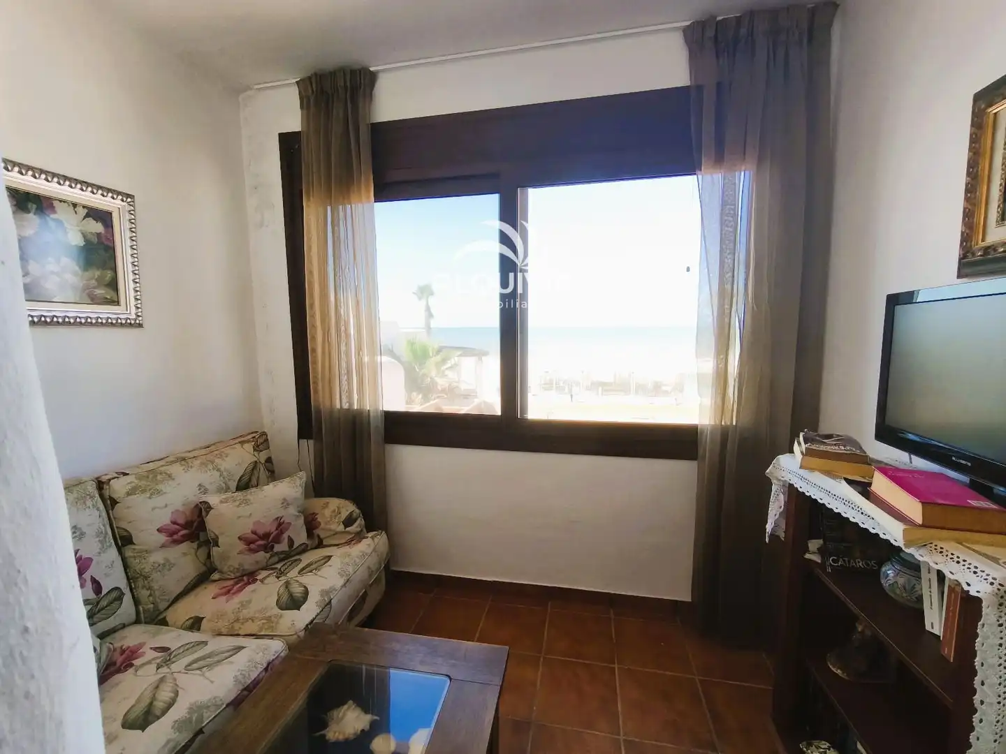 Sala d'estar de Casa adosada de lloguer en Almonte amb Jardí privat, Terrassa i Moblat