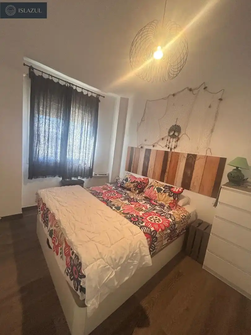 Dormitori de Apartament en venda en Isla Cristina amb Aire condicionat, Jardí privat i Terrassa