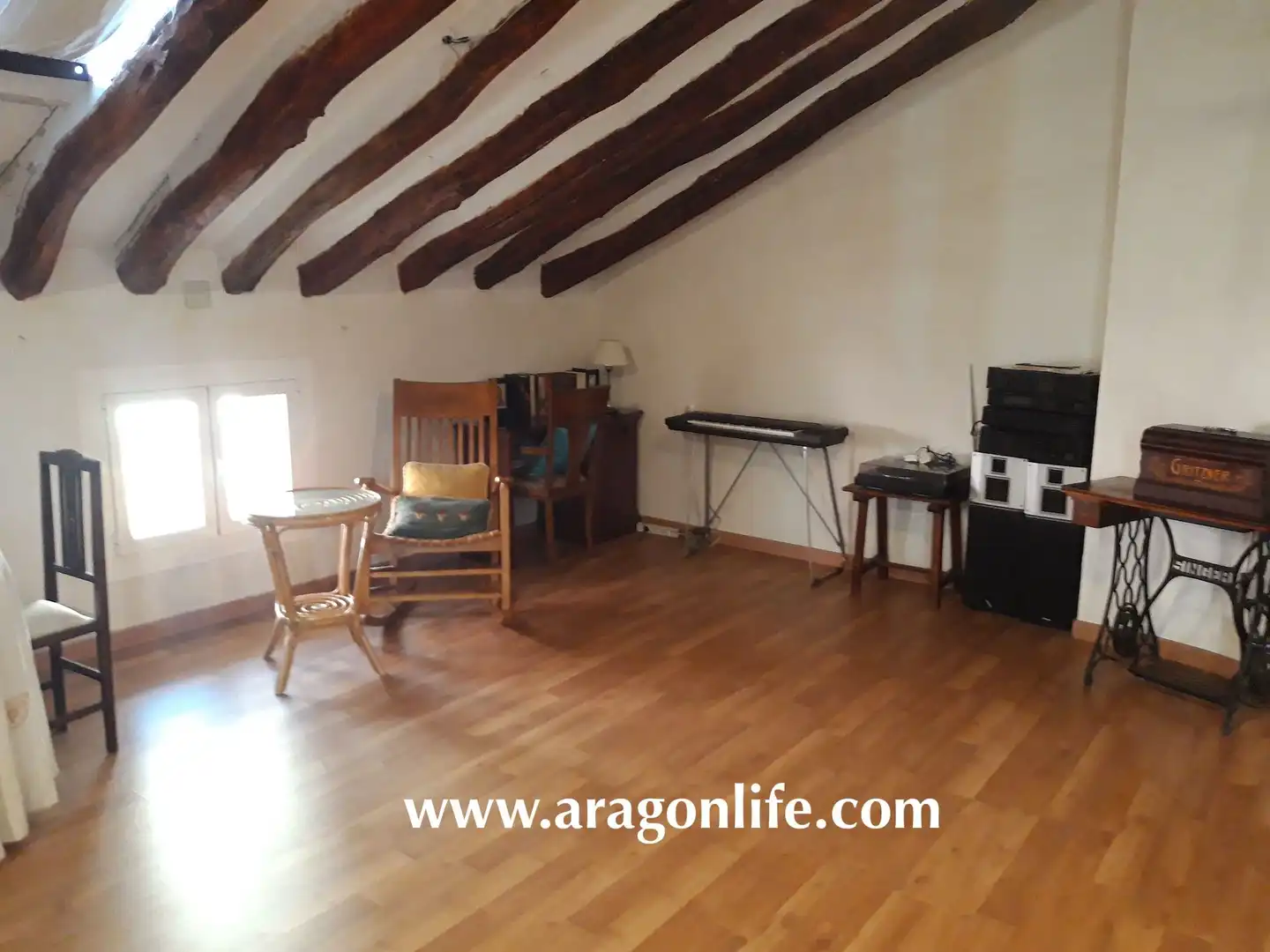 Sala de estar de Casa o chalet en venta en Caspe con Aire acondicionado, Parquet y Amueblado