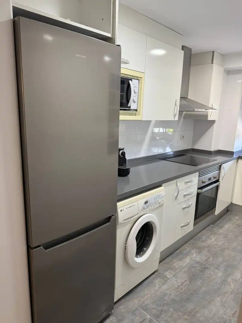 Cuina de Apartament de lloguer en El Puig de Santa Maria amb Aire condicionat, Moblat i Piscina comunitària