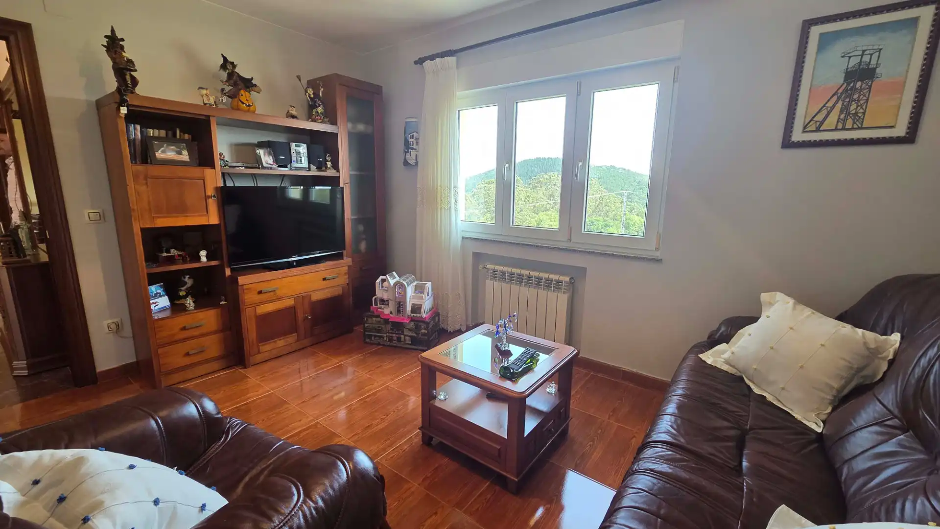 Sala d'estar de Casa o xalet en venda en Pravia amb Calefacció, Jardí privat i Terrassa