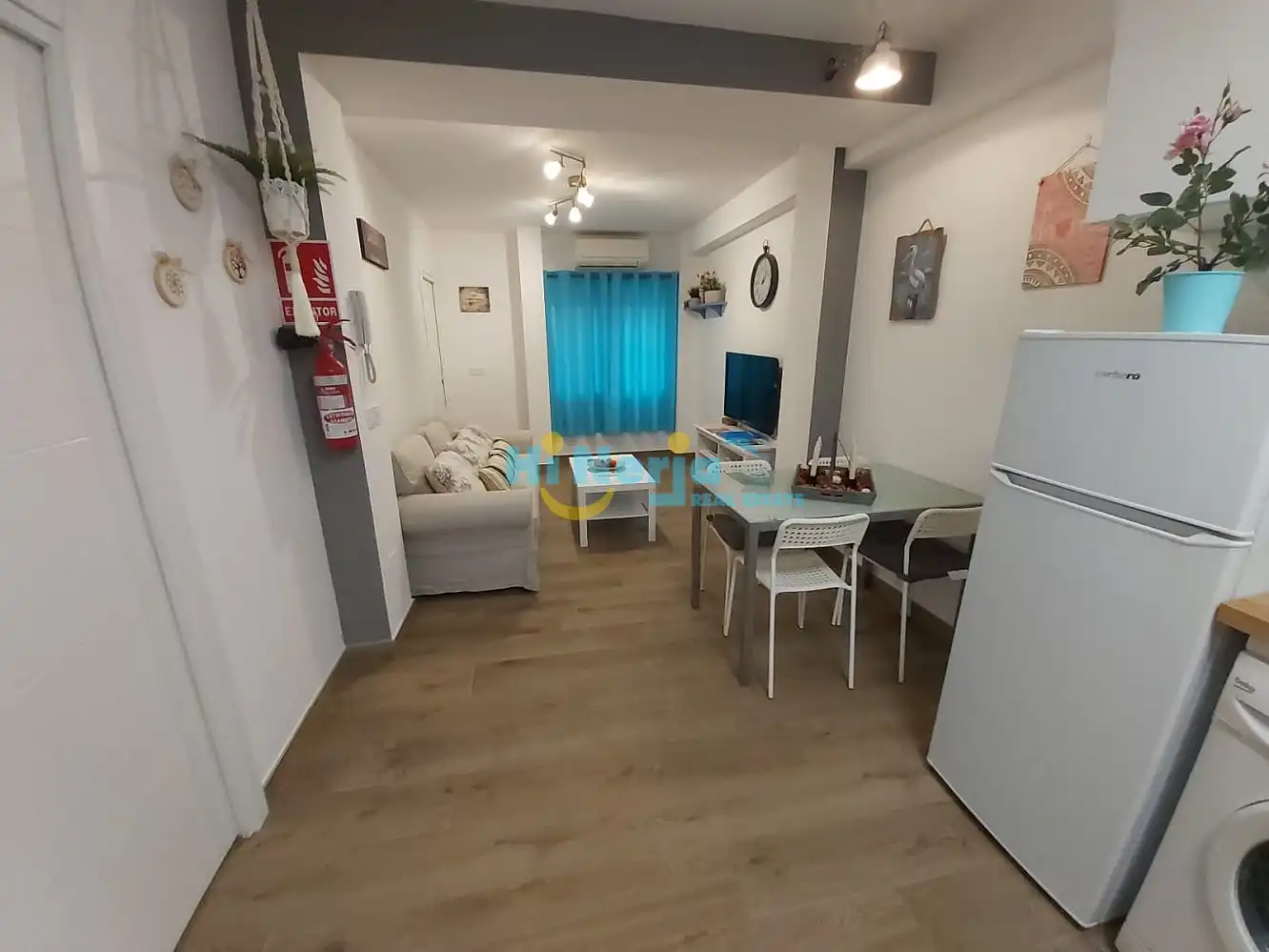 Sala d'estar de Apartament de lloguer en Nerja amb Aire condicionat, Calefacció i Moblat