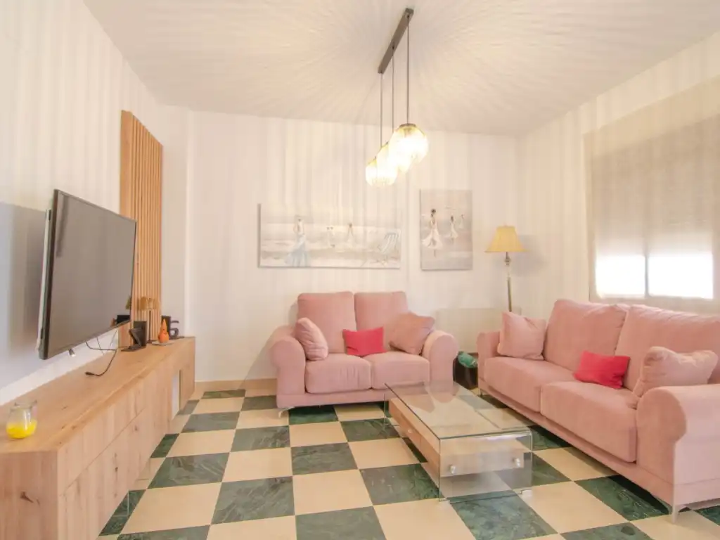 Sala d'estar de Casa o xalet en venda en La Rinconada