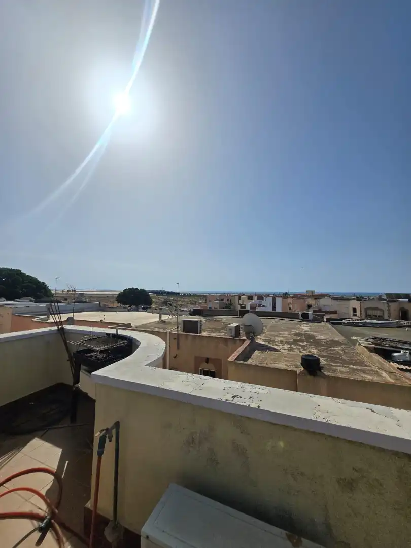 Vista exterior de Casa adosada en venda en El Ejido amb Aire condicionat, Terrassa i Piscina