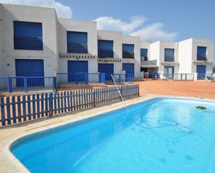 Swimming pool of Single-family semi-detached for sale in Alcanar  with Heating, Terrace and Community pool