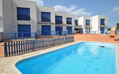 Swimming pool of Single-family semi-detached for sale in Alcanar  with Heating, Terrace and Community pool