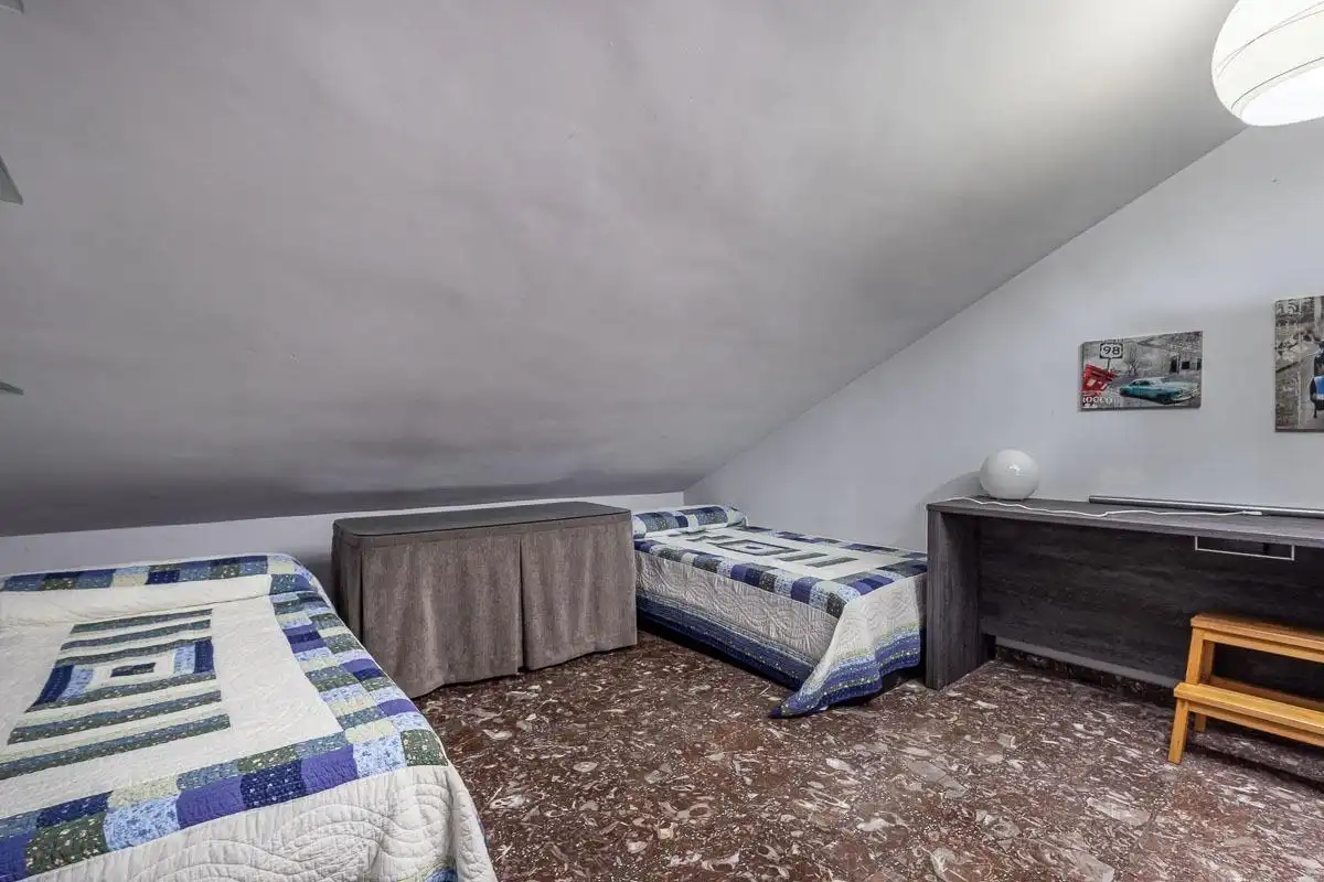 Schlafzimmer von Dachboden zur Miete in Maracena mit Terrasse und Möbliert