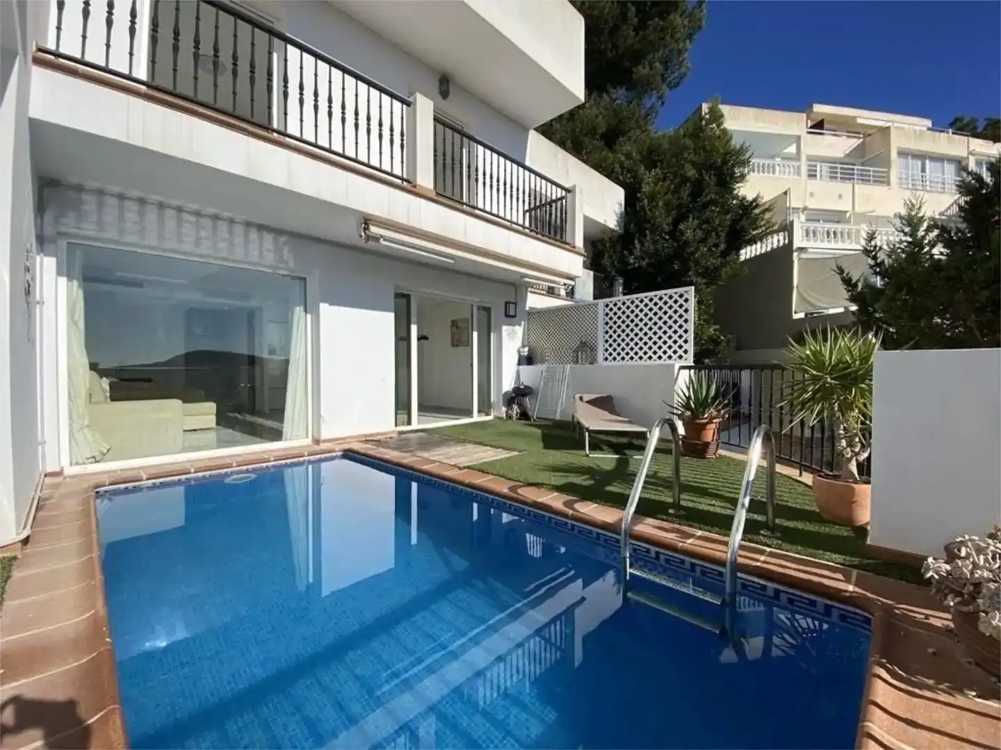 Piscina de Dúplex en venda en Santa Eulària des Riu amb Aire condicionat, Jardí privat i Piscina