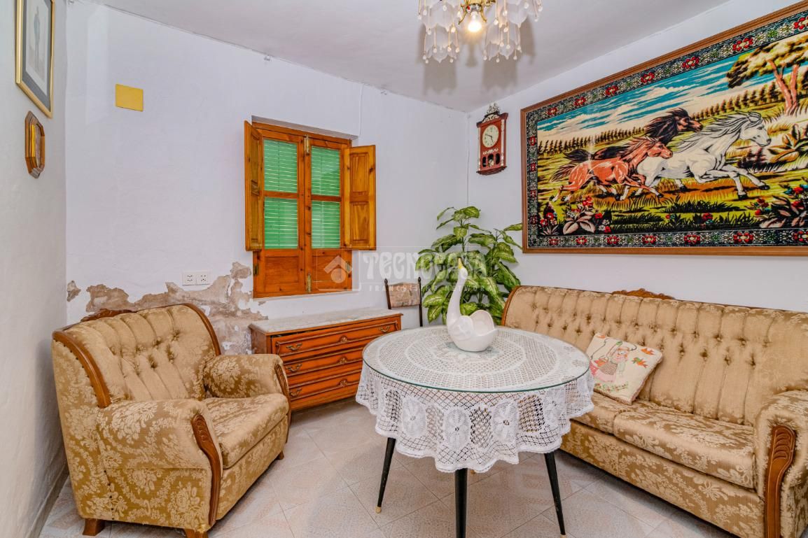 Sala d'estar de Casa adosada en venda en Zagra amb Jardí privat, Terrassa i Balcó