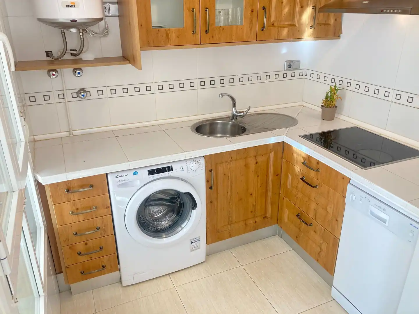Kitchen of Flat for sale in Roquetas de Mar  with Air Conditioner, Terrace and Swimming Pool