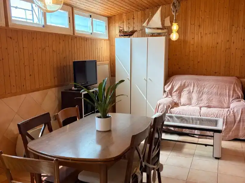 Sala d'estar de Dúplex per a compartir en Almería amb Aire condicionat, Moblat i Balcó