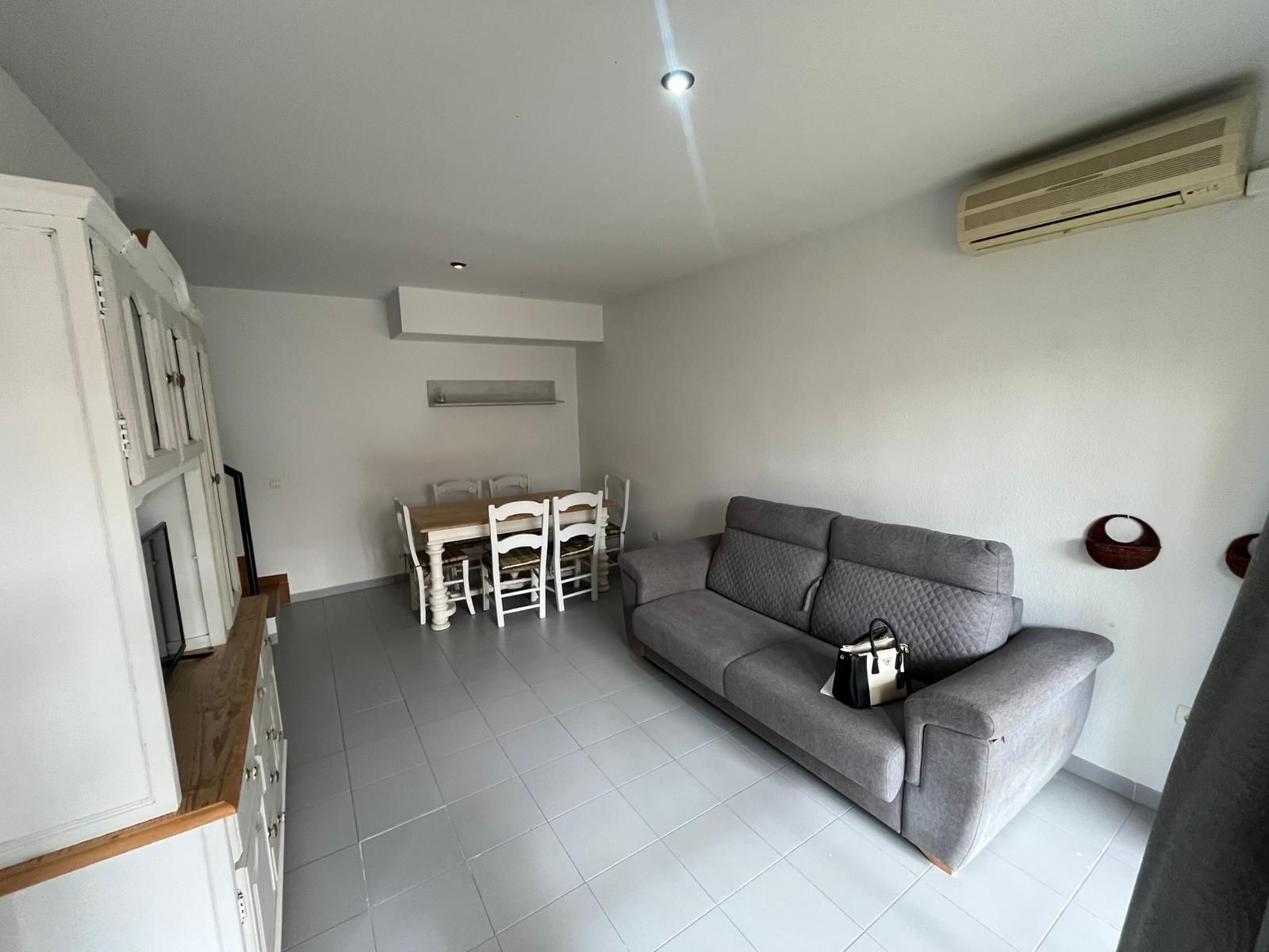 Sala d'estar de Casa adosada en venda en El Portil amb Terrassa, Moblat i Balcó