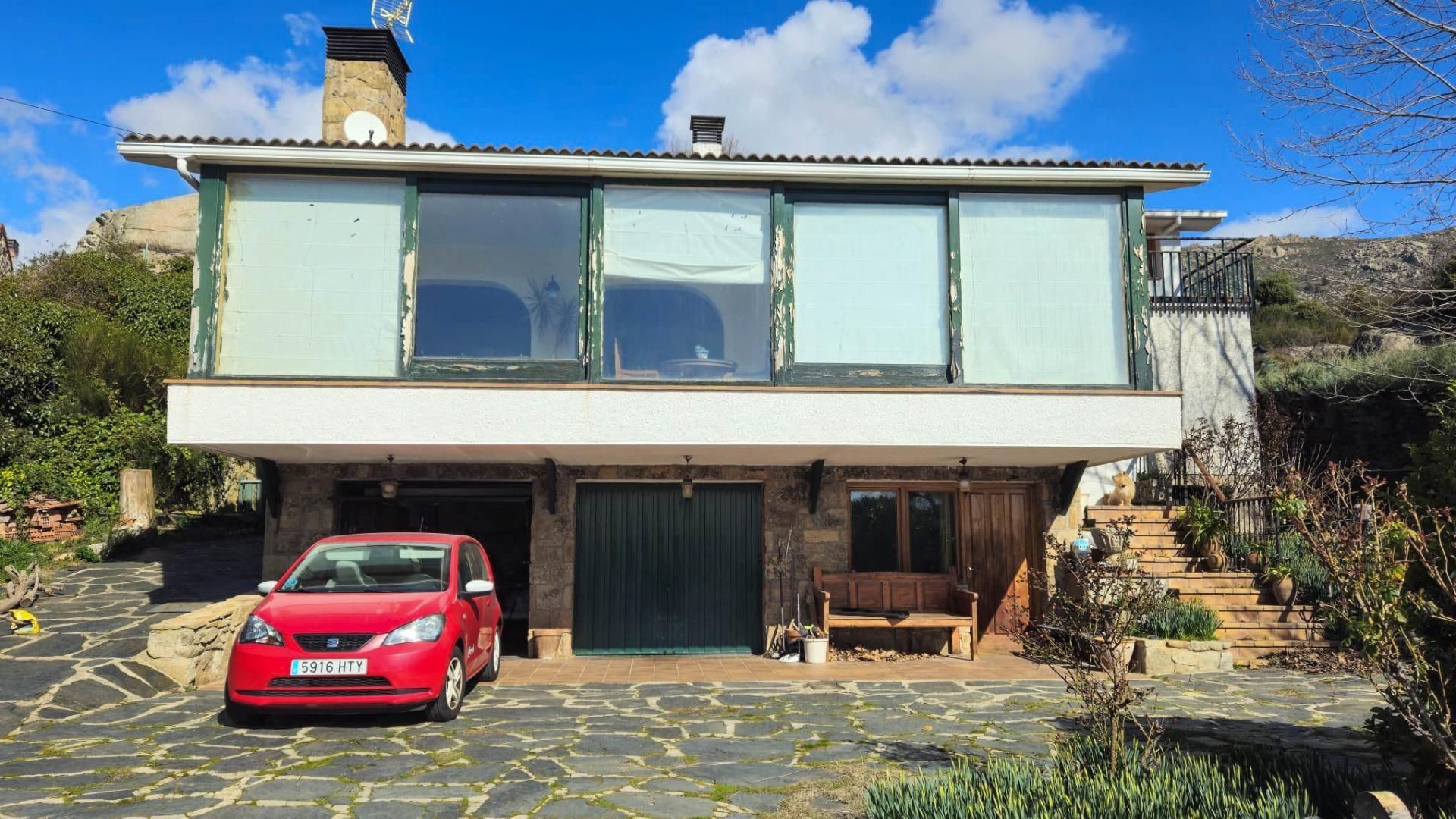 Vista exterior de Casa o xalet en venda en El Boalo - Cerceda – Mataelpino amb Calefacció