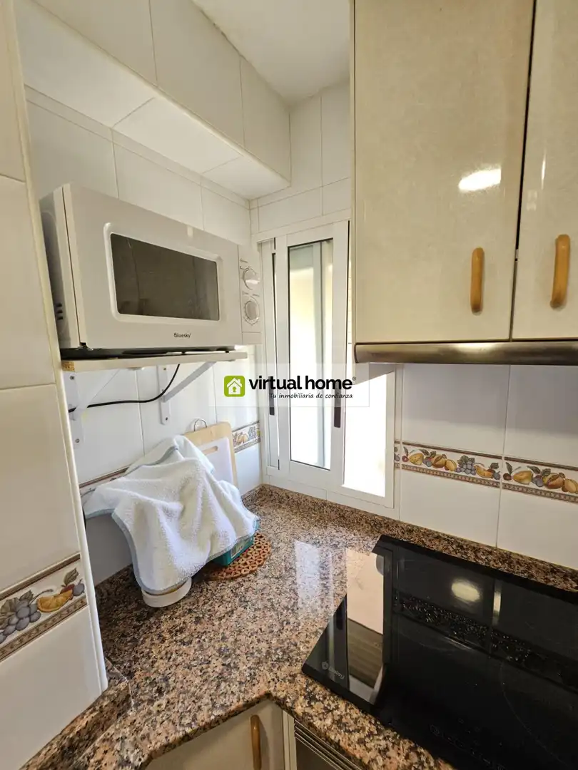 Kitchen of Flat for sale in Benidorm  with Air Conditioner, Terrace and Furnished
