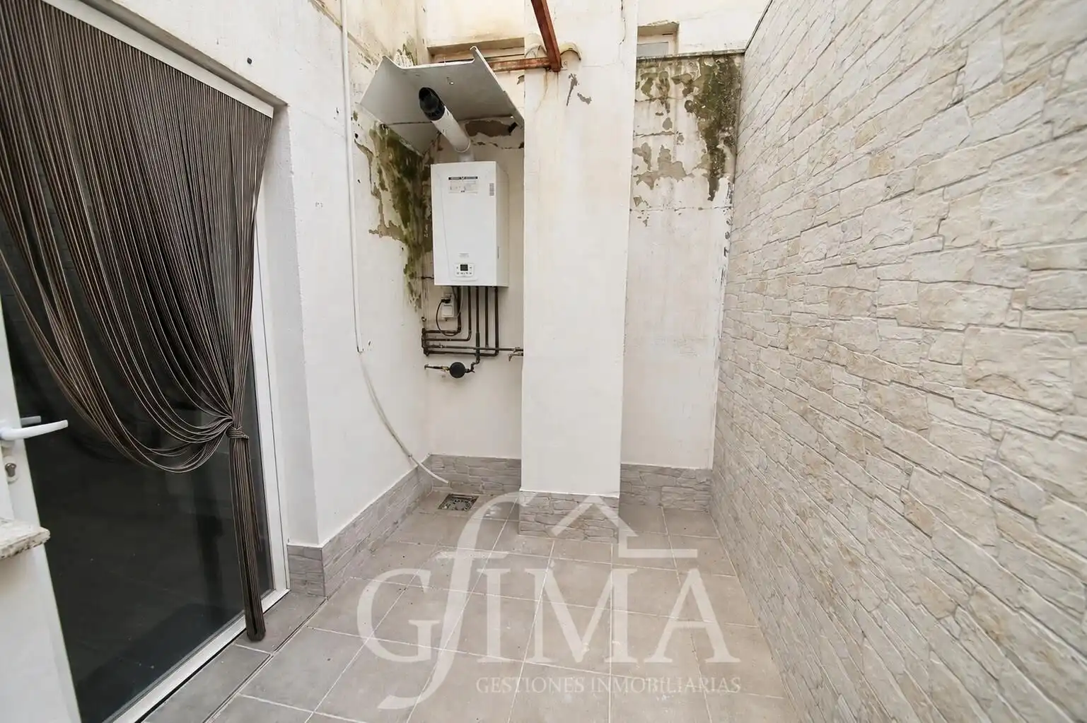 Jardín de Casa adosada en venta en Tomelloso con Calefacción y Trastero