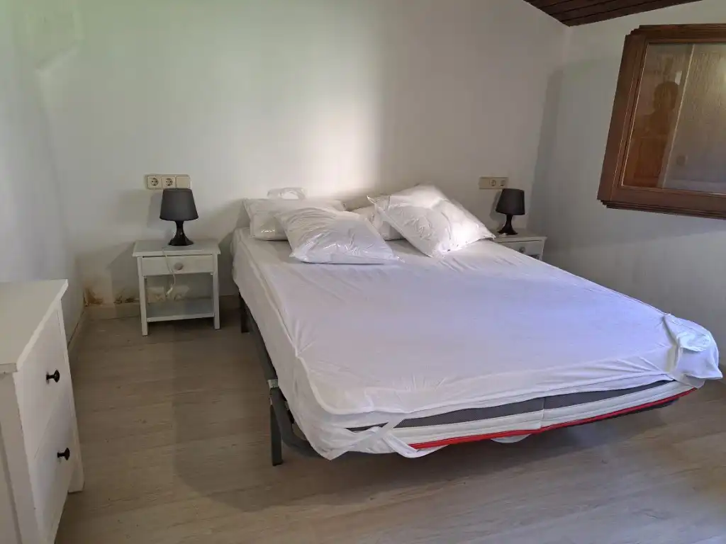 Schlafzimmer von Erdgeschoss zur Miete in Das mit Heizung, Privatgarten und Parkett