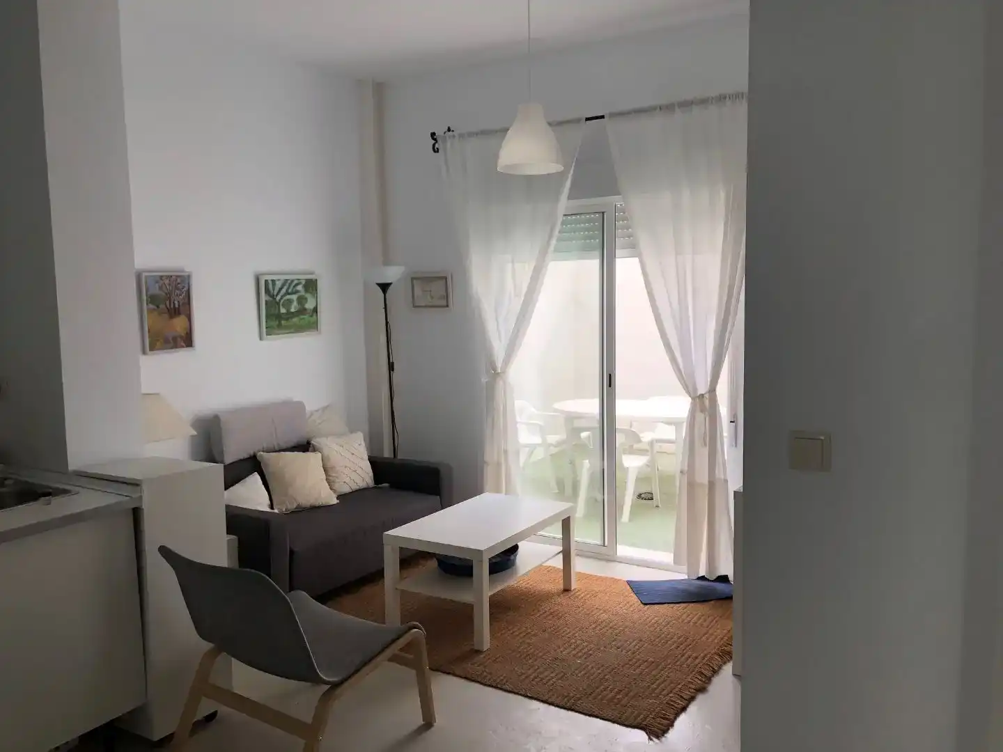 Sala de estar de Casa adosada en venta en Motril con Amueblado, Horno y Lavadora