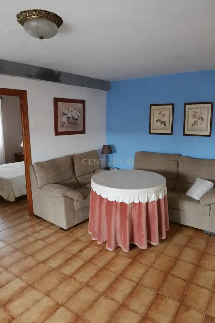 Sala de estar de Casa adosada en venta en Herrera de Alcántara con Trastero