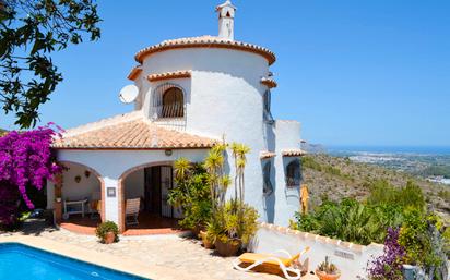 Vista exterior de Casa o xalet en venda en Pedreguer amb Aire condicionat, Terrassa i Piscina