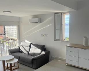 Sala d'estar de Estudi de lloguer en La Manga del Mar Menor amb Aire condicionat