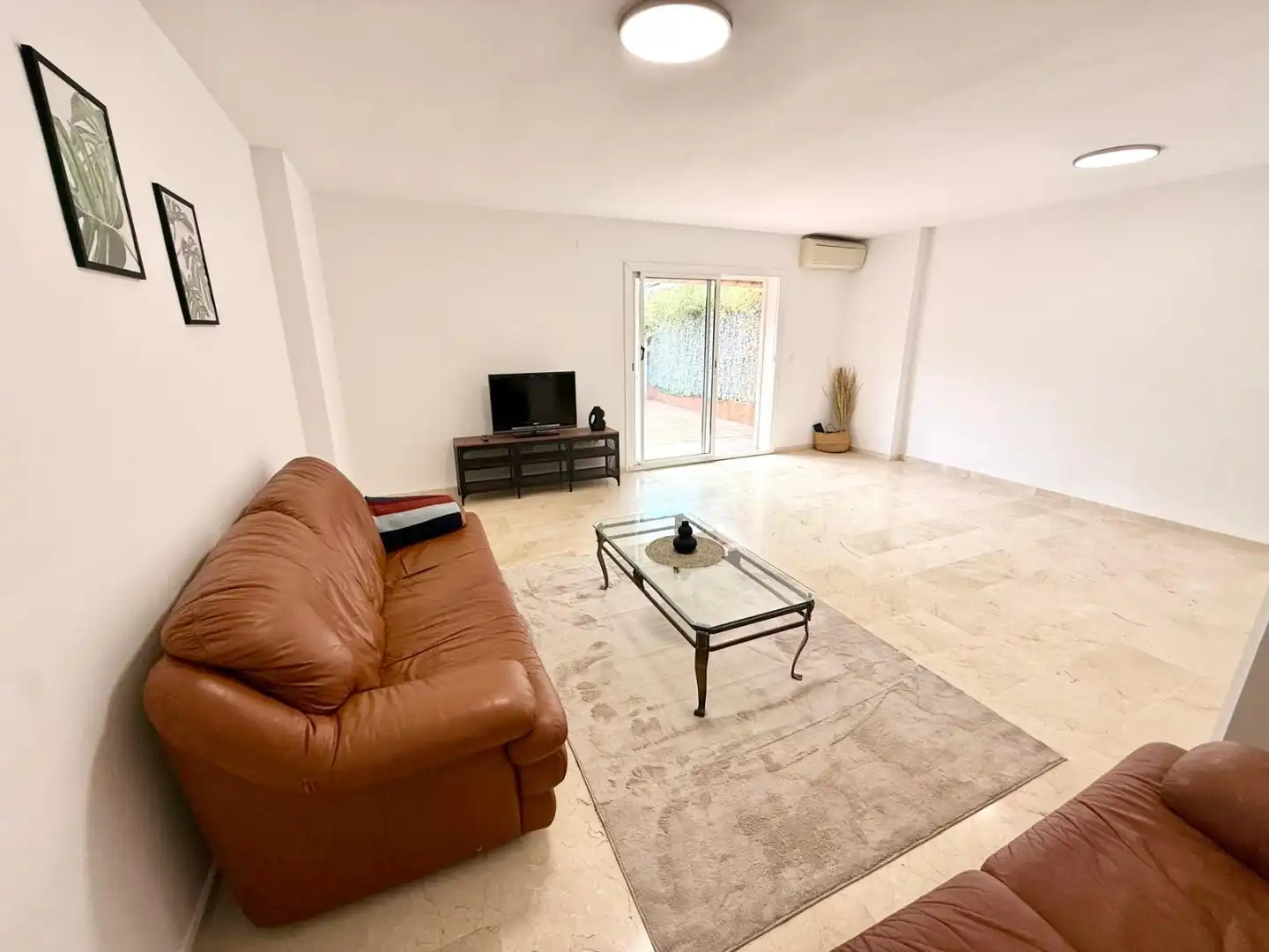 Sala d'estar de Casa o xalet en venda en L'Alfàs del Pi amb Aire condicionat, Terrassa i Balcó