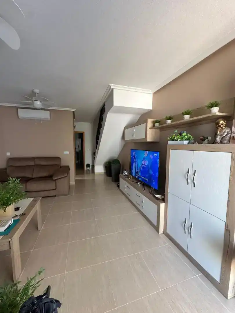 Sala d'estar de Casa adosada en venda en Pulpí amb Aire condicionat i Balcó