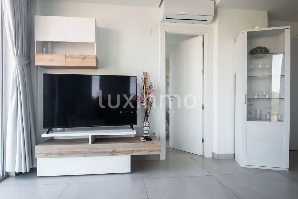 Wohnzimmer von Wohnung zum Verkauf in Finestrat mit Klimaanlage, Privatgarten und Terrasse