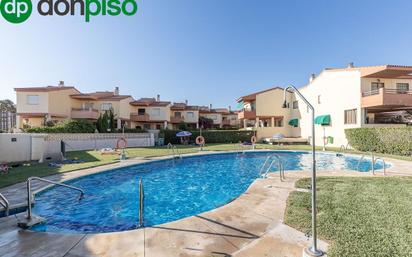 Swimming pool of Single-family semi-detached for sale in Salobreña  with Private garden, Parquet flooring and Terrace