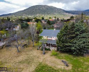 Exterior view of House or chalet for sale in Gargantilla del Lozoya  with Heating, Private garden and Storage room