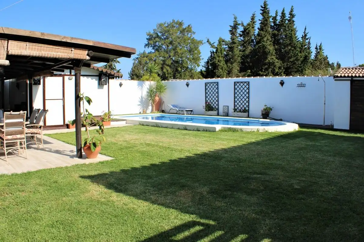 Jardí de Casa o xalet de lloguer en Chiclana de la Frontera amb Jardí privat, Terrassa i Piscina
