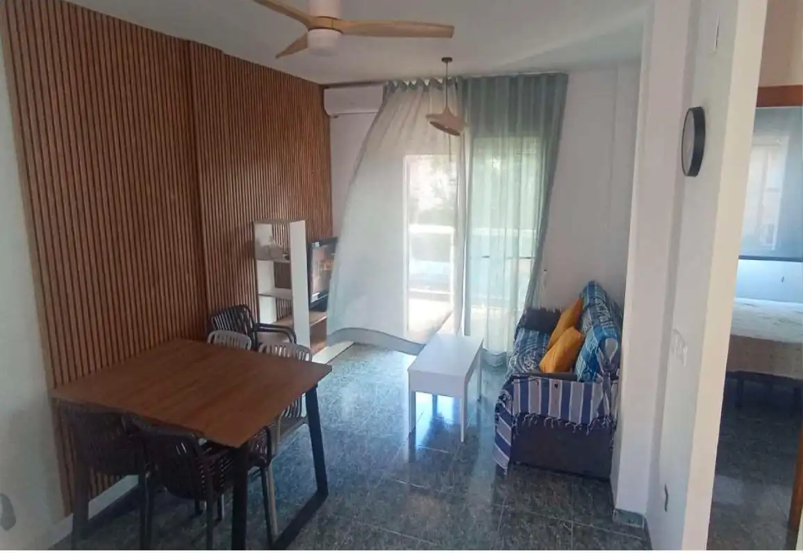 Sala d'estar de Apartament de lloguer en Vinaròs amb Terrassa, Moblat i Piscina comunitària